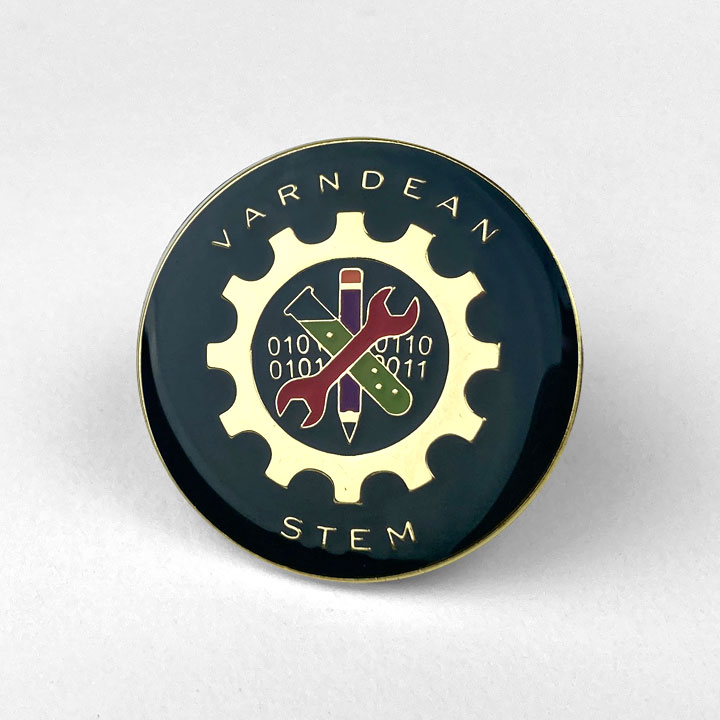 School Badges - STEM, showing a cog framing some binary numbers, a test tube, a pencil and a spanner - Toop Studio